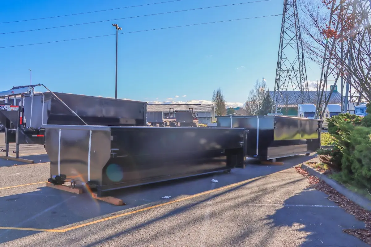 Roll-off dumpster ready for waste disposal at job site for Concrete Dumpster Rental in Nocatee